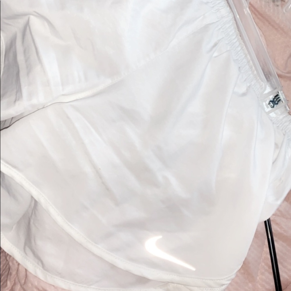 White nike running shorts